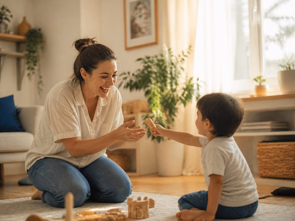 ABA therapist and young child playing together during a therapy session